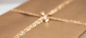 gold gift with sparkly gold ribbon