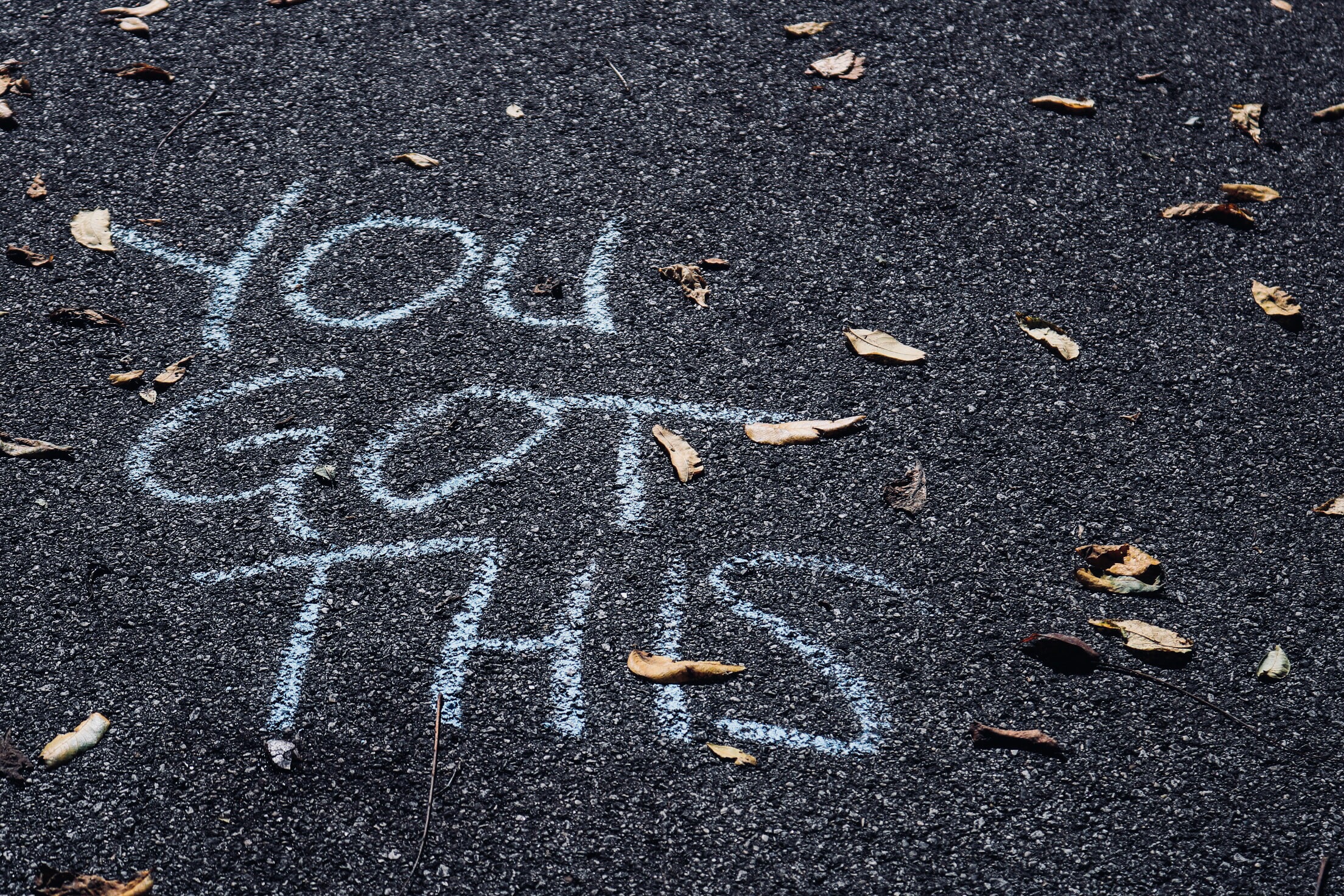 Photot: 'you got this' written in chalk on concrete