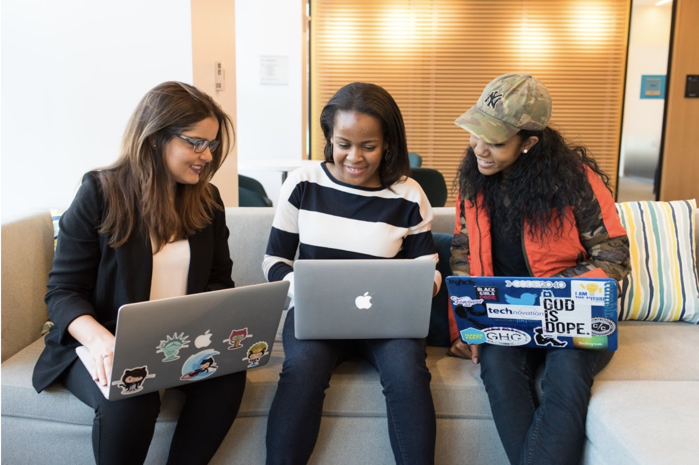 group of women in business casual attire