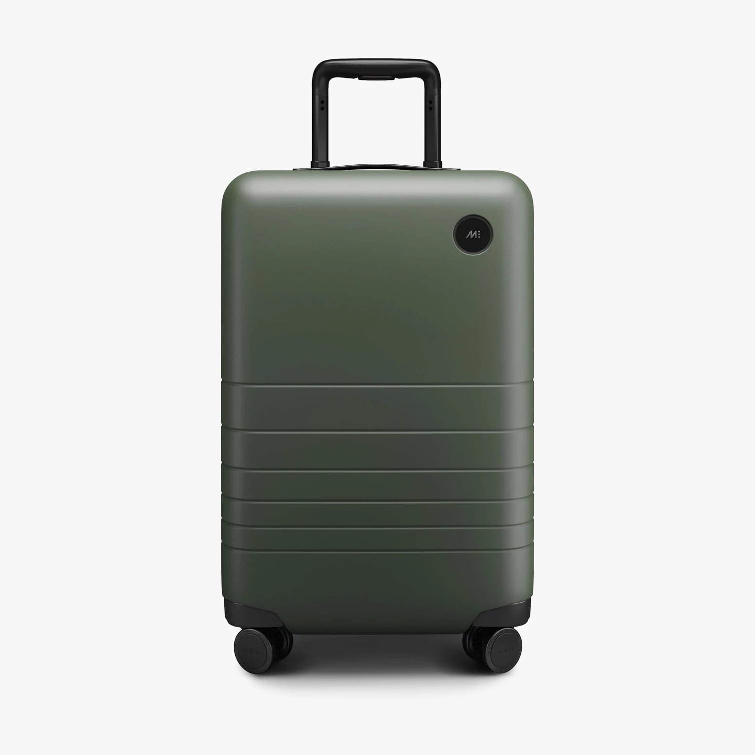 Olive Green hard case carry on luggage. Click this image to be taken to the Monos website to buy your luggage.
